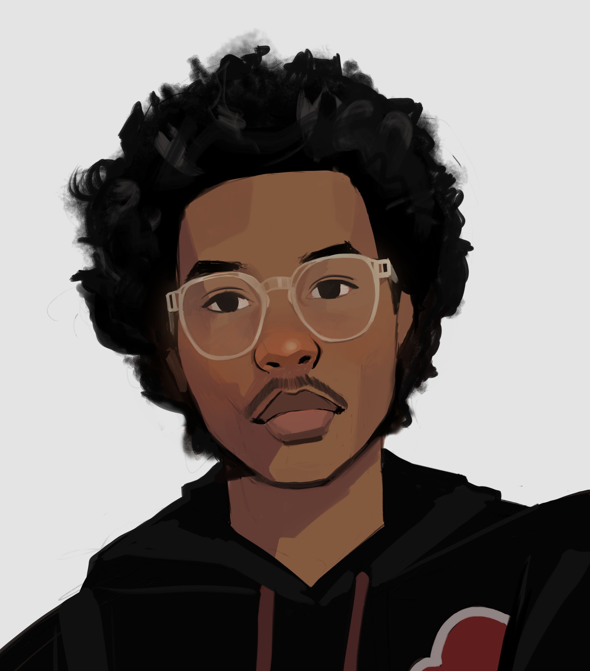 Small avatar of myself. I have a large afro, and am wearing glasses with transparent frames, and a black hoodie with red drawstrings.